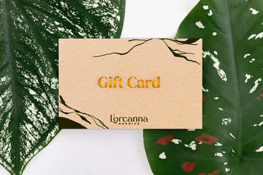 Gift card with 'Lércanna' branding on a leafy background